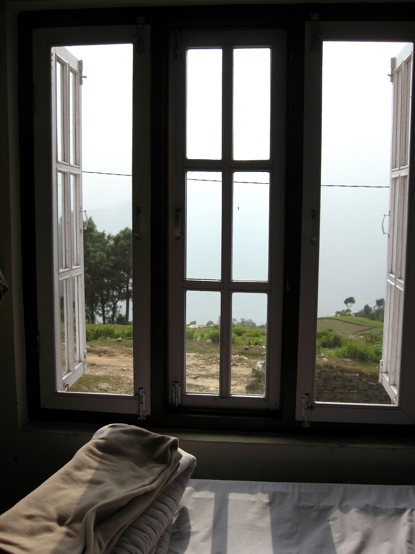 Morning light through a guest room window in the hills